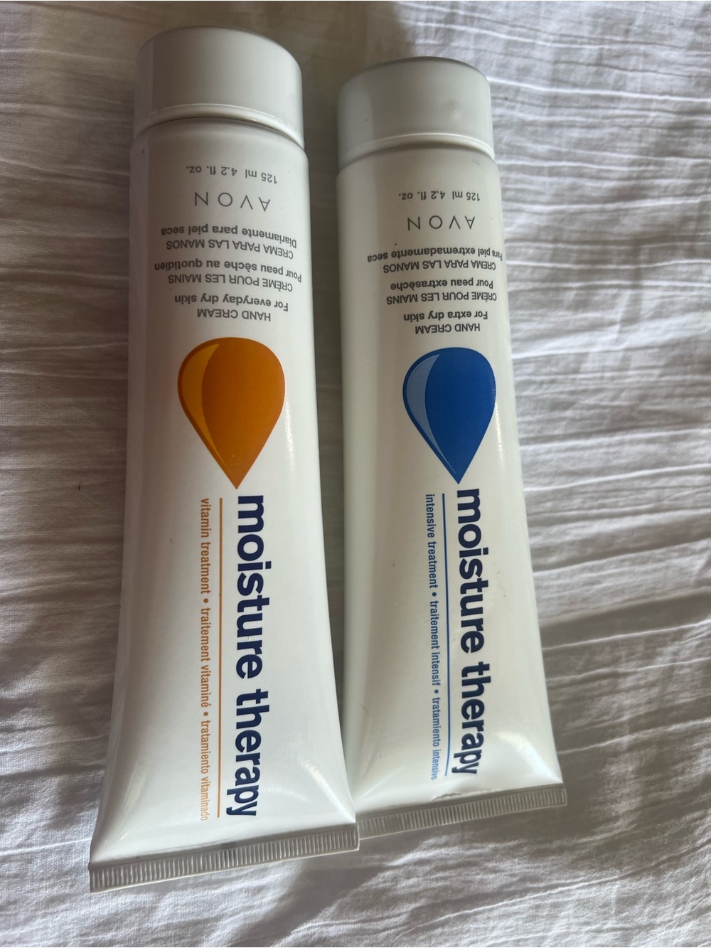 Avon Moisture Therapy Hand Cream Duo — Blue & Orange Accents